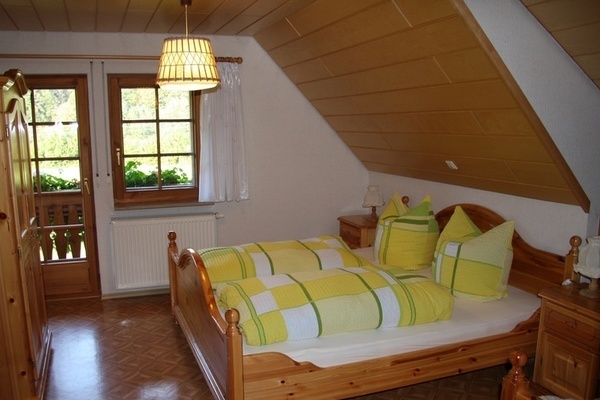 Schlafzimmer mit Balkon